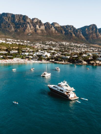 A Cape Town beach called Clifton Beach from the sea of yachts docked in the bay.